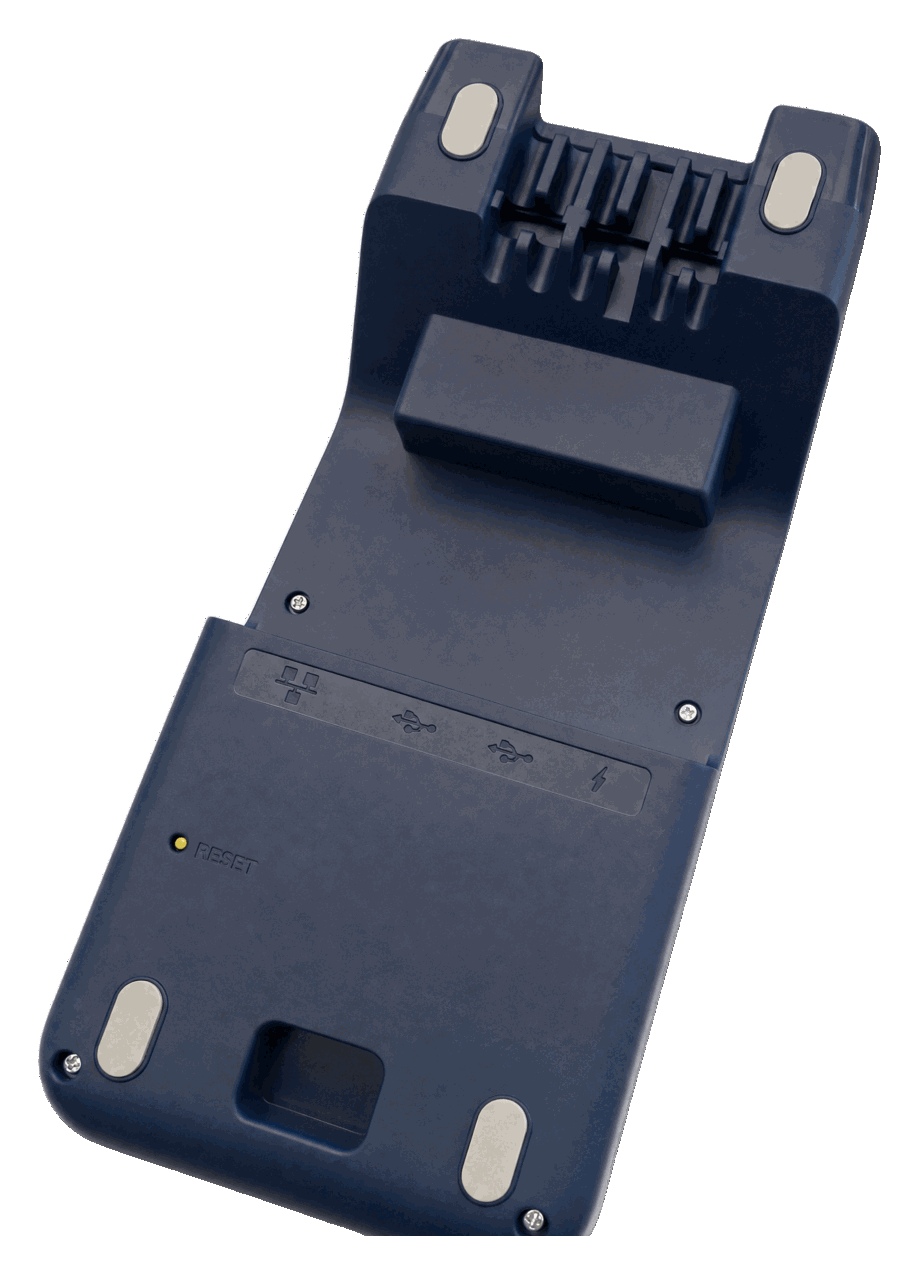 Underside of the SurfPrint Pro K Multicomm Base, showing the Ethernet, USB-A, USB-C and power ports and the reset button
